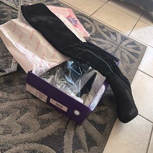 Brand new thigh high black suede boots, size 5.5